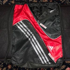 Adidas string backpack. Back and red.